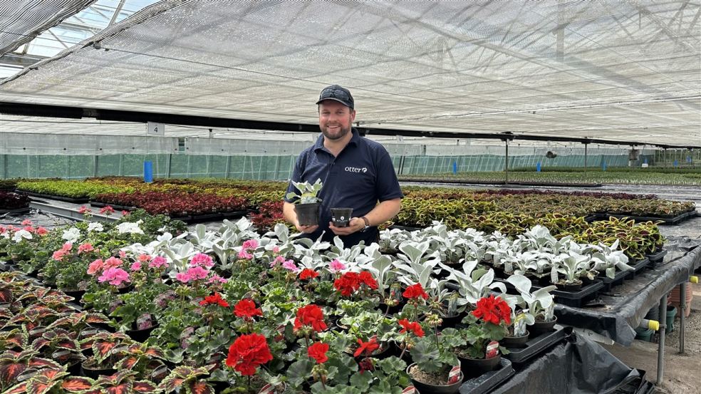 Richard Lovering potting up the eco-pots at Otter Garden Centre in Ottery Potting up eco-pots at Otter Garden Centre in Ottery