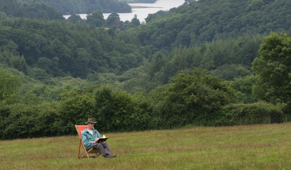 The Paignton Poet penning his next poem. Credit: National Trust / James Breslin