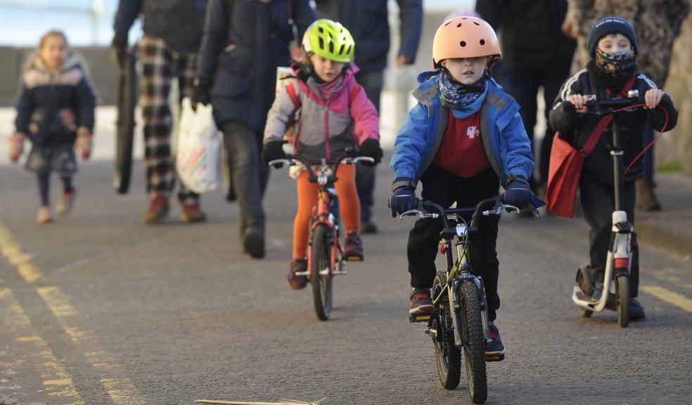 Children walking, cycling and scooting to school