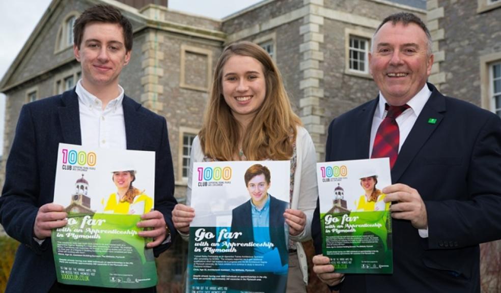 Councillor Tudor Evans, Leader of the Council, with local apprentices Chris and Elena.