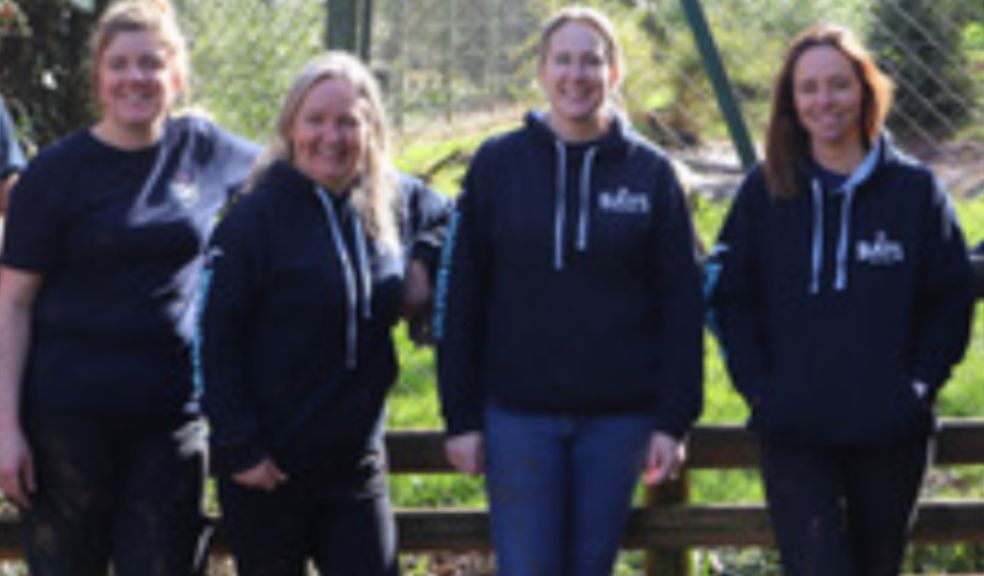 4 people from Bays Brewery smiling at camera