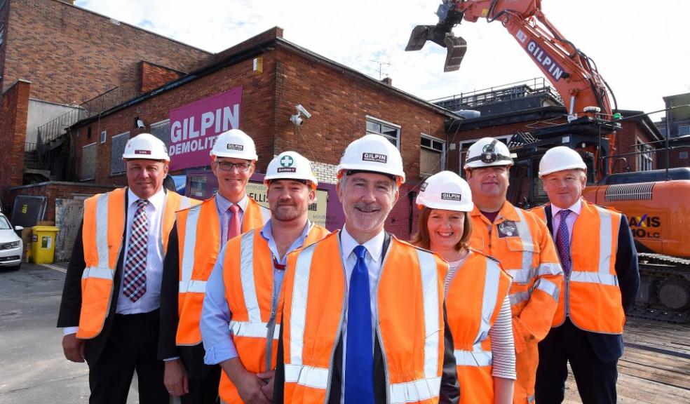 Plymouth City Council and Gilpin officials join Council Leader Ian Bowyer as demolition at Colin Campbell Court begins. Image courtesy of Plymouth City Council