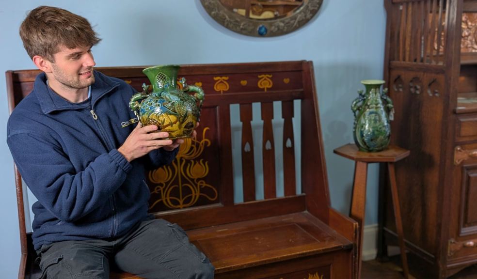 Cataloguer Barnaby Willis with examples of Brannam Pottery and Shapland and Petter furniture Cataloguer Barnaby Willis with examples of Brannam Pottery and Shapland and Petter furniture