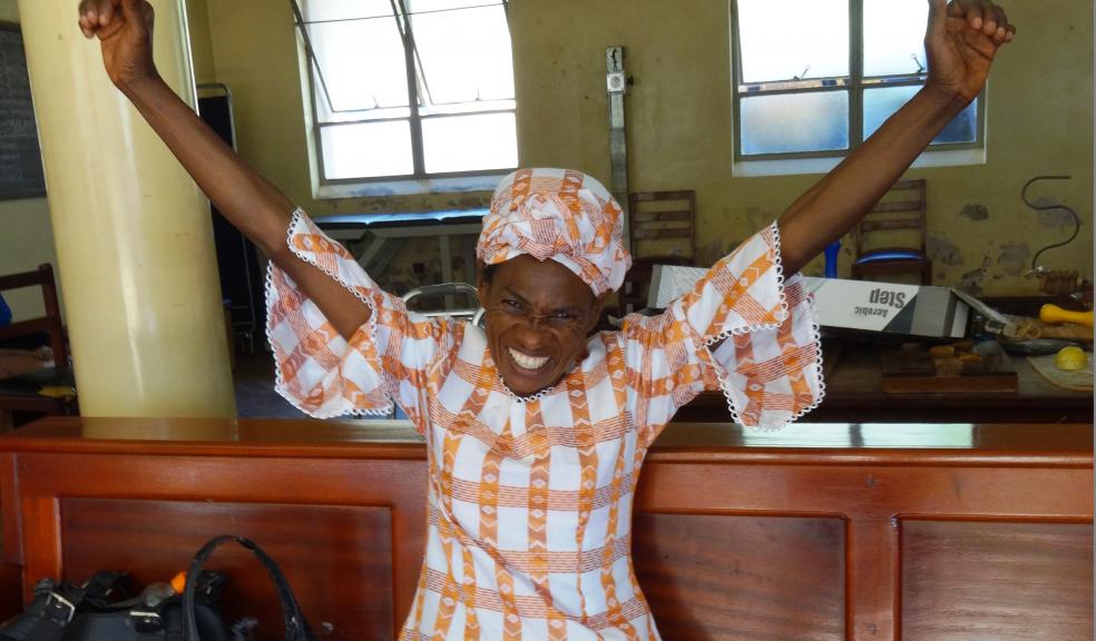A happy patient completes her pulmonary rehabilitation programme in rural Uganda
