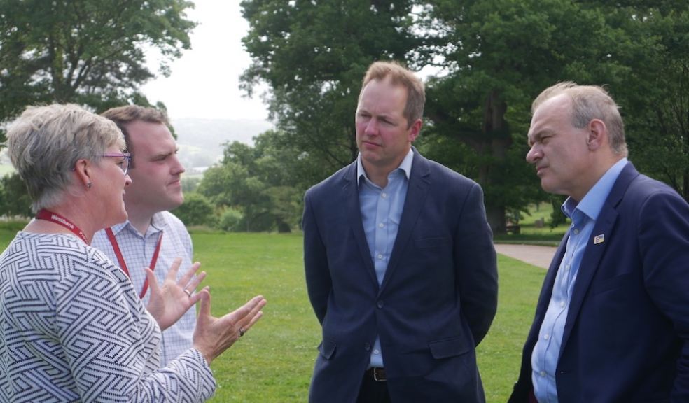 Suzie Walters-Jeffries & Andy Hood of Devon Carers talking to Lib Dem PPC Richard Foord & Party Leader Sir Ed Davey at Knightshayes