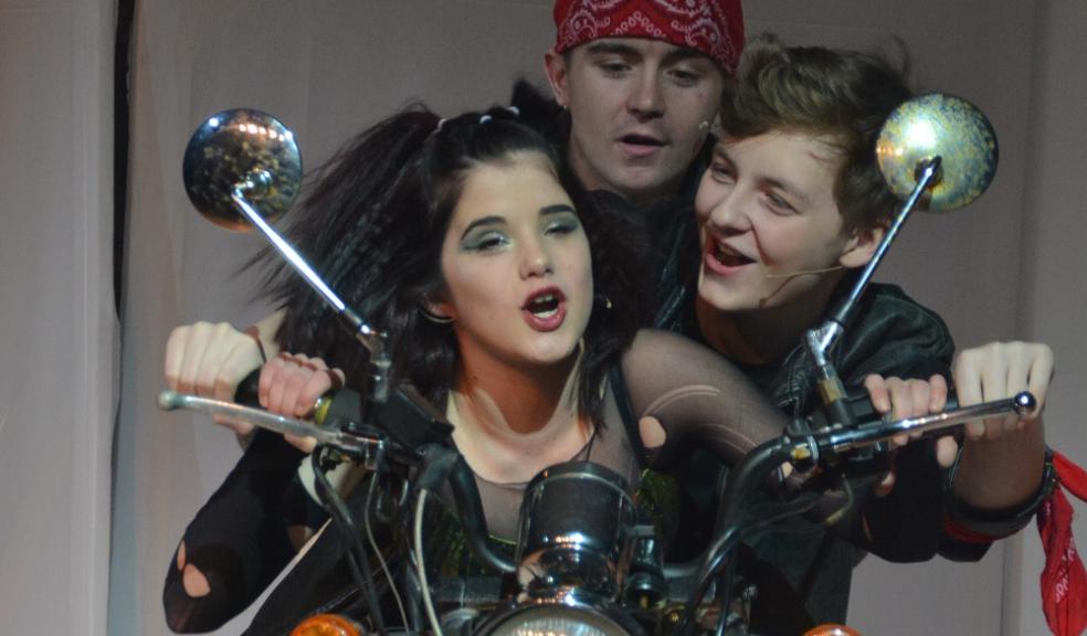 Photo caption: From front to back: Maisie Smith (Scaramouche), Daniel Hillon (Galileo) and Brandon Russell (Pop). Brandon Russell
