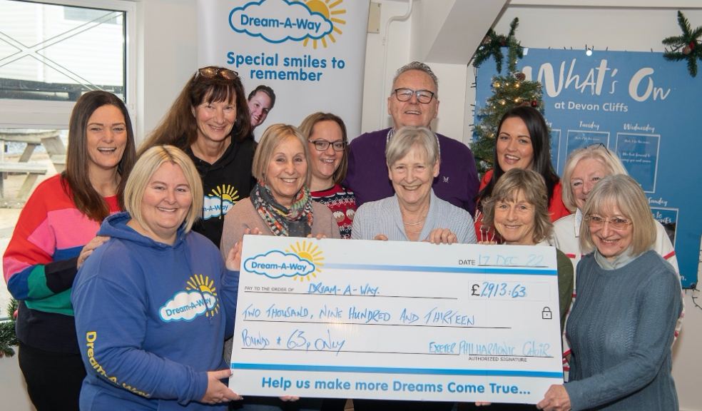 Exeter Philharmonic Choir members present a cheque for donations raised from December's carol concerts to local charity Dream-A-Way. Photo: Maxy Maxwell Photography.