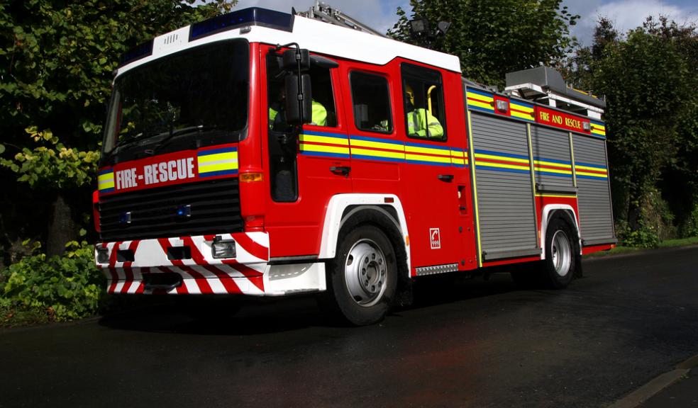 Woman in car drops twenty feet into a garden