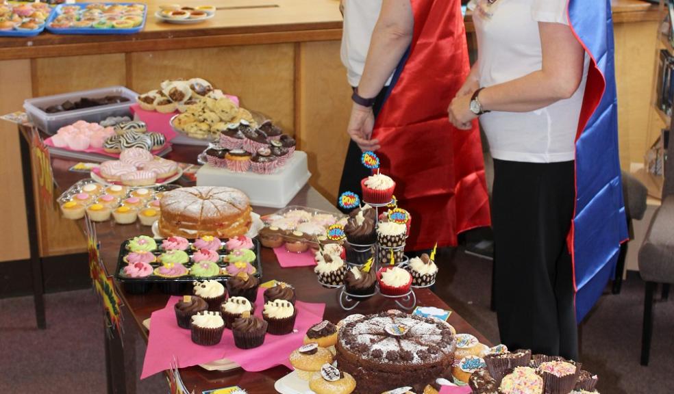 Photo caption: Julie McGlinchey (LRC Manager) and Debra Clift (Teaching Assistant) who both baked cakes along with Year 7 members of the Student Book Club.