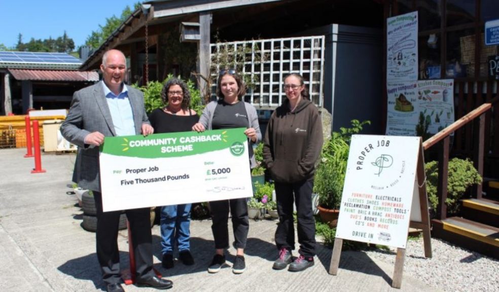 Nick Vivian presenting Proper Job with a cheque from SPAR's Community Cashback scheme Money for Proper Job in Devon from SPAR Community Cashback scheme