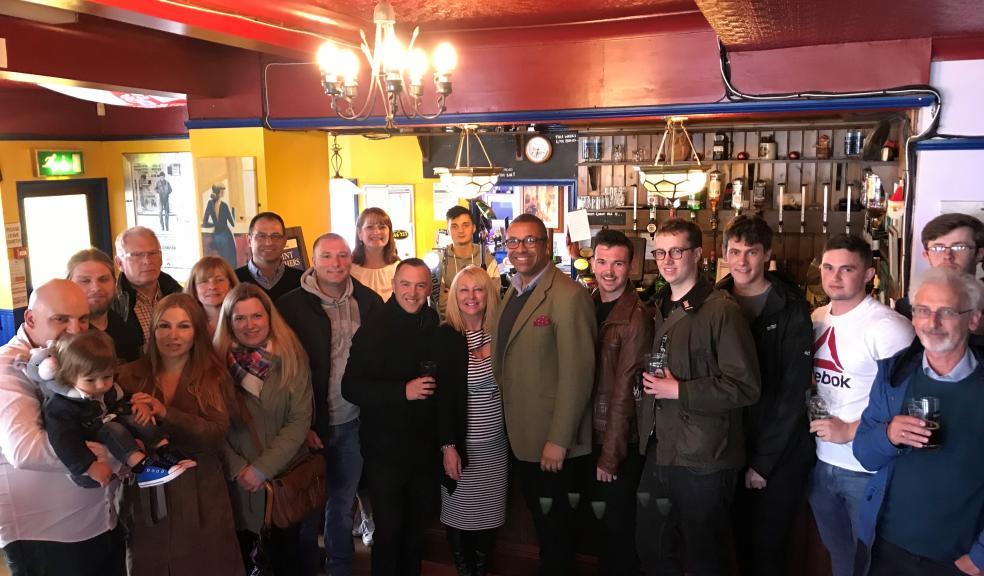 James Cleverly (centre), the Conservative Party Deputy Chairman, is pictured in the Seymour Arms pub with council candidate Steven Ricketts and local activists.