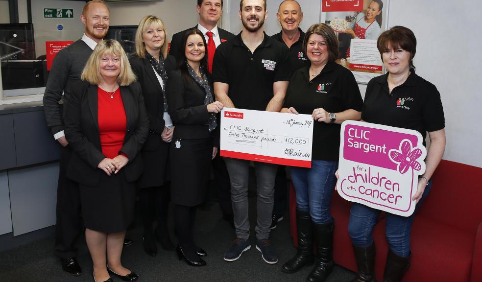 Sam Abrahams, Claire Colman and Frank Tiley from La La Choirs presenting a cheque for £12,000 to Jordan Anderton from CLIC Sargent with the staff of the Exmouth branch of Santander