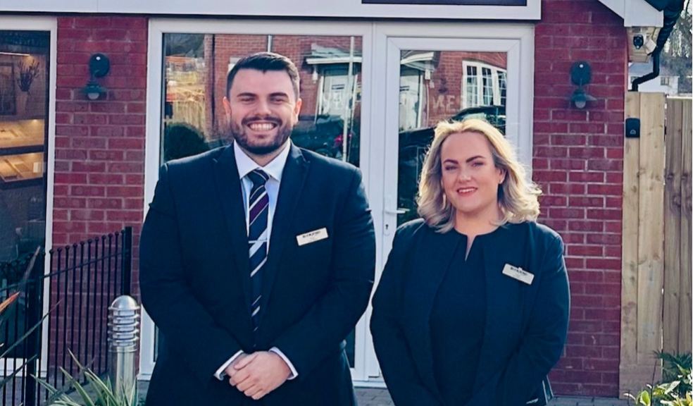 Bloor Homes welcomed its first visitors to the brand new interactive sales suite and showhomes at Dawlish View Two members of Bloor Homes' sales team outside the sales centre ready to welcome visitors