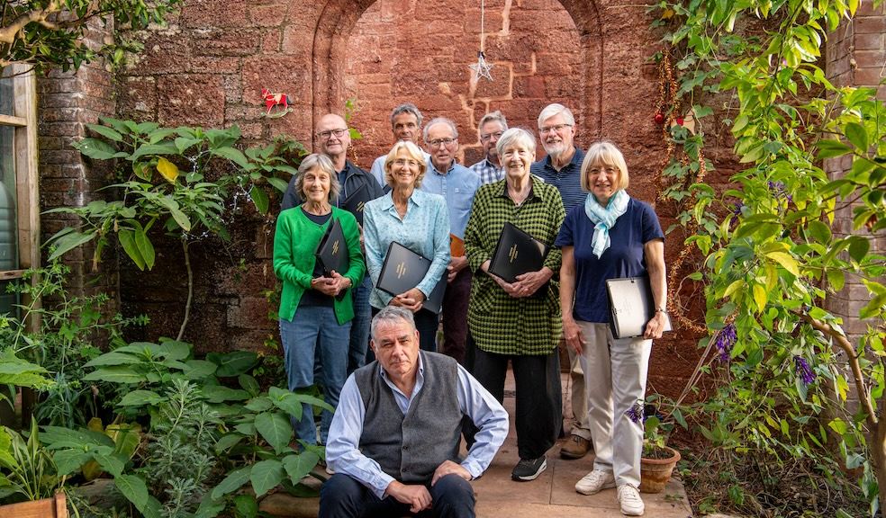 Compere, well-known historian Dr Todd Gray, with some of the choir's members Compere, well-known historian Dr Todd Gray, with some of the choir's members