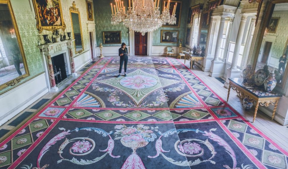 Curator Zoe Shearman in the Saltram Saloon following the installation of the protective reweave created by Axminster Carpets. Photo: National Trust/Steve Haywood.