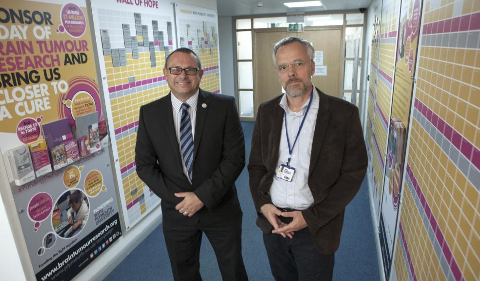 Picture caption: Peter Jordan with Professor Oliver Hanemann from the Plymouth University Brain Tumour Research Centre of Excellence.