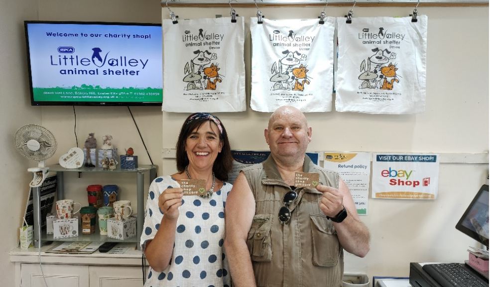 Dawn Key, Retail Manager for RSPCA Little Valley Animal Shelter, and volunteer George Kemp with The Charity Shop Gift Card. RSPCA Little Valley Animal Shelter, gift card shop
