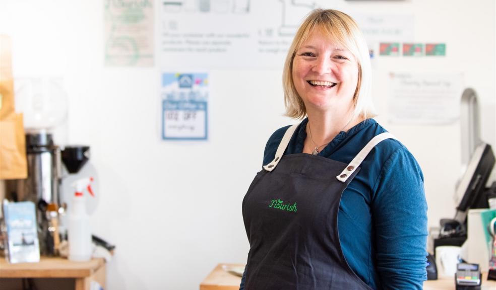 Sarah Martin from Nourish Woman in zero waste shop in Exeter