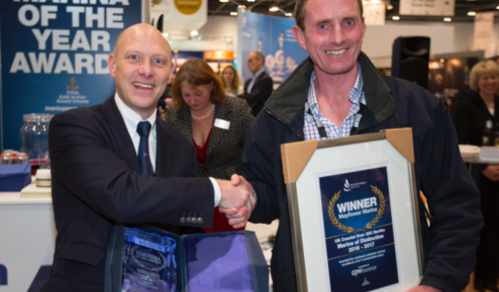 L-R: Glen Wallis, Business Development Manager at GJW, presents Charles Bush, Managing Director of Mayflower Marina, with Marina of Distinction
