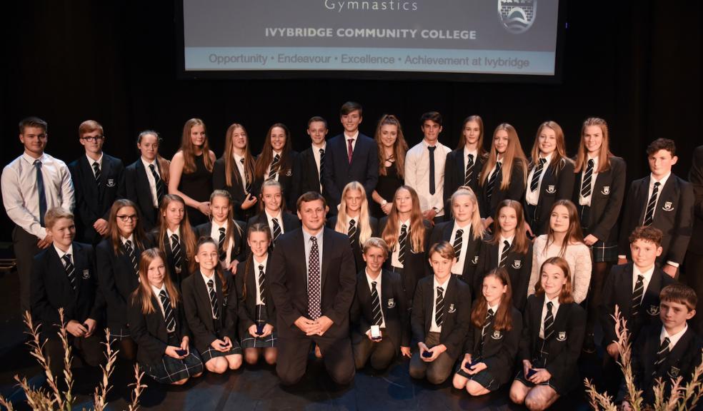 The UK's most successful school gymnastics from Ivybridge Community College team with Andy Birkett (Centre)