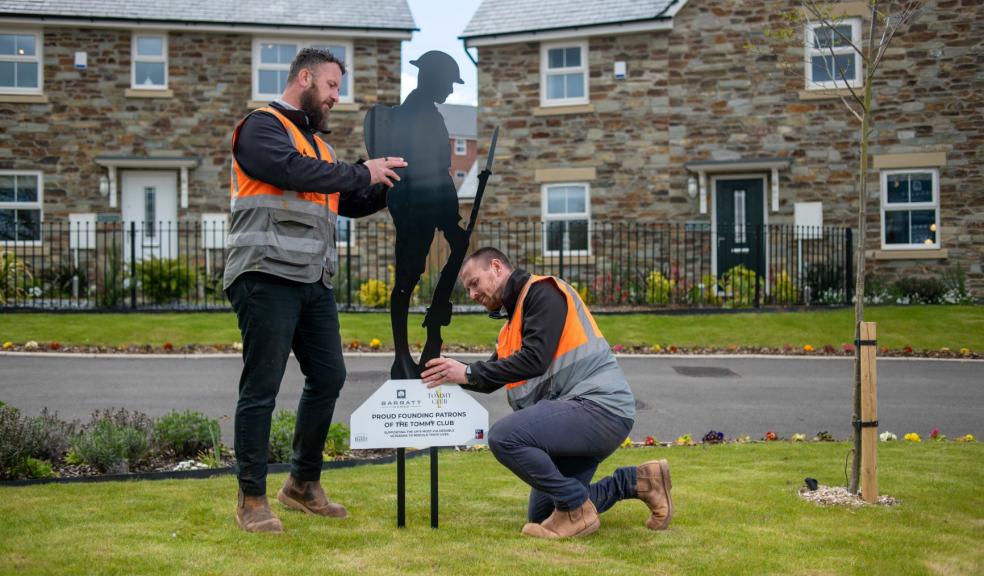 Ben Trussler (L) & Chris Spencer (R), Braid Park, Tiverton site managers installing Tommy figure at Braid Park, Tiverton