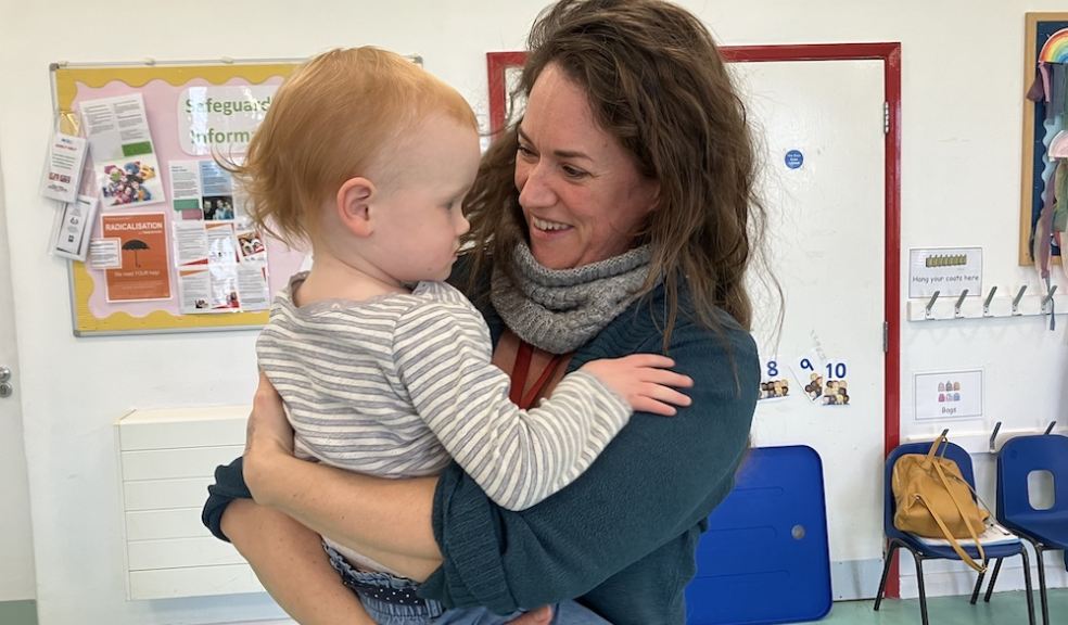 Westbank's Kidzone Manager Lucy Elliott with one of the toddlers in her care Westbank's Kidzone Manager Lucy Elliott with one of the toddlers in her care