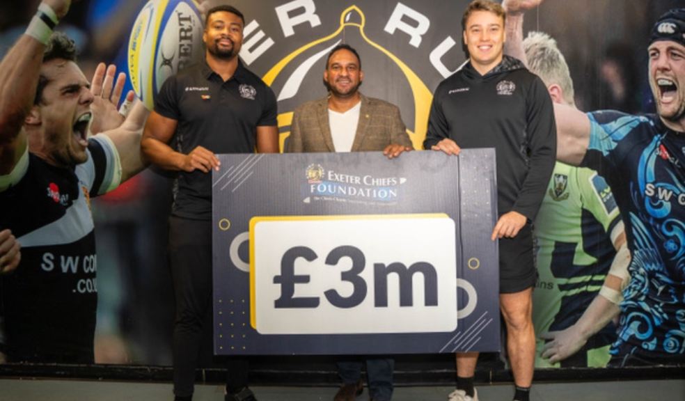 The Exeter Chiefs Foundation charity has launched a drive to reach £3m Celebrity Chef Michael Caines, with two Exeter Chiefs rugby players holding a £3 million board