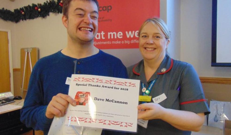 David McCannon receives an award at Derriford Hospital.