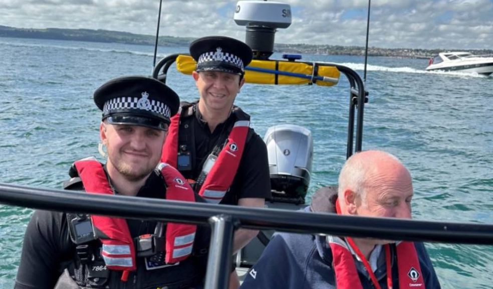 Photo caption: Police officers on patrol with Harbourmasters