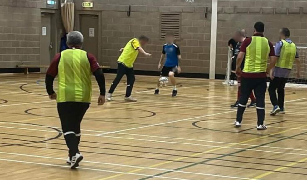 Photo: players in action at the community football session