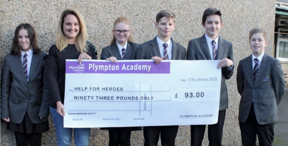 Sam Kellond from Help for Heroes with students left to right: Evie Dutton, Abigail Franklin, Max Clake, Rhys Dutton and Dylan Cook.