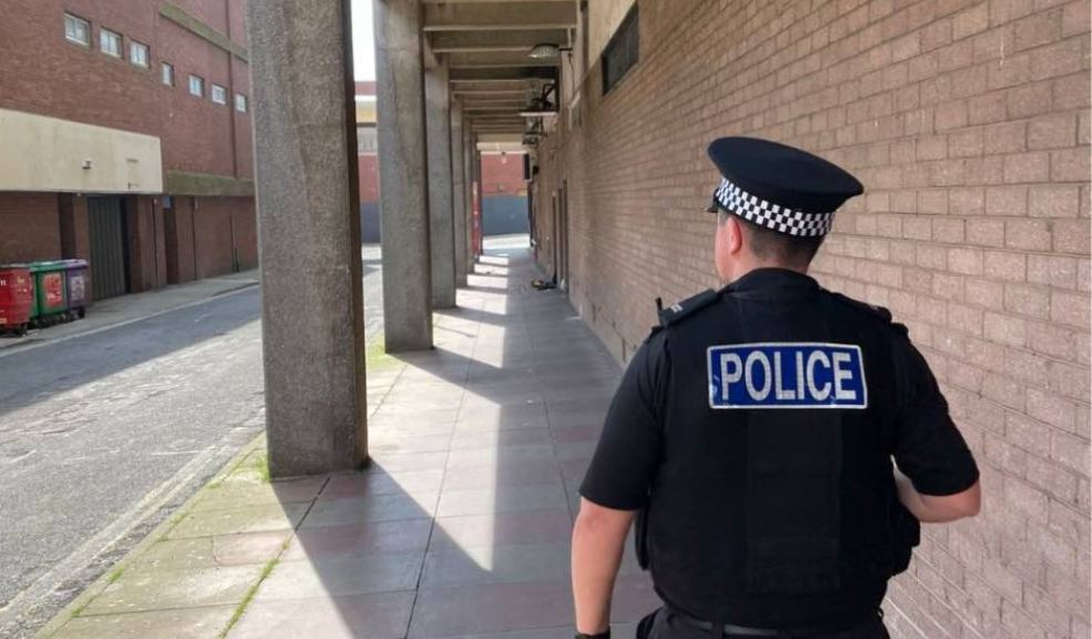 Photo caption: Police officer on patrol in Torquay