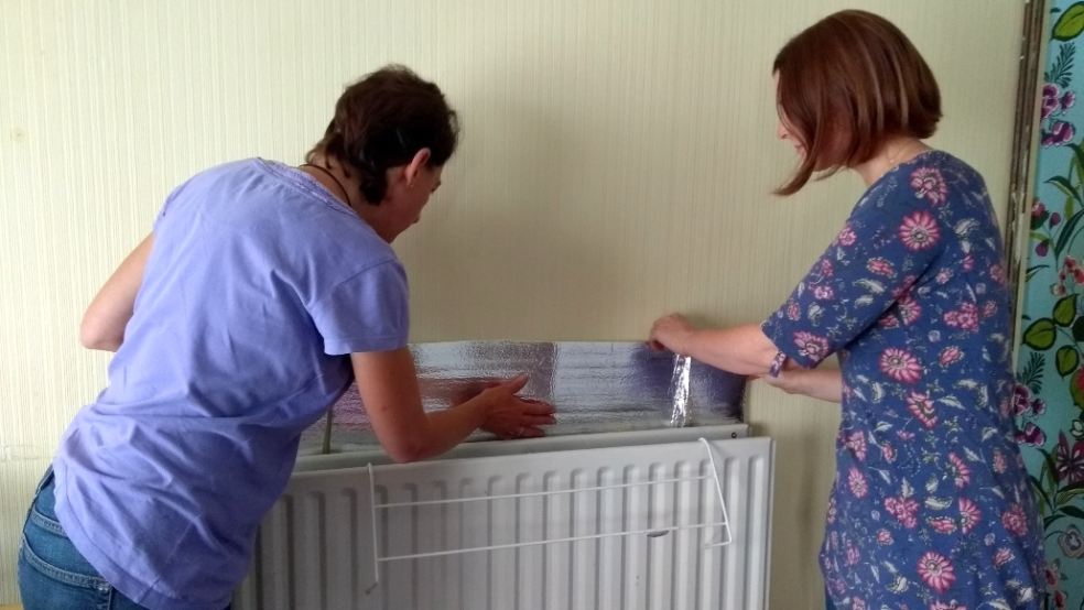 Exeter Community Energy reflective radiator shield