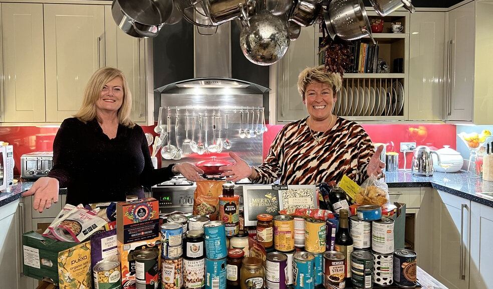 Glen King and Mary Pugsley MBE in the kitchen