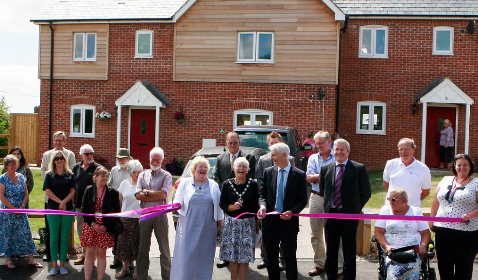 Ribbon cutting ceremony – Christine Turner, chair of Spectrum Premier Homes, Su Hunt, Chair of North Dorset District Council and Richard Hill, Chief Executive of Spectrum Housing Group.