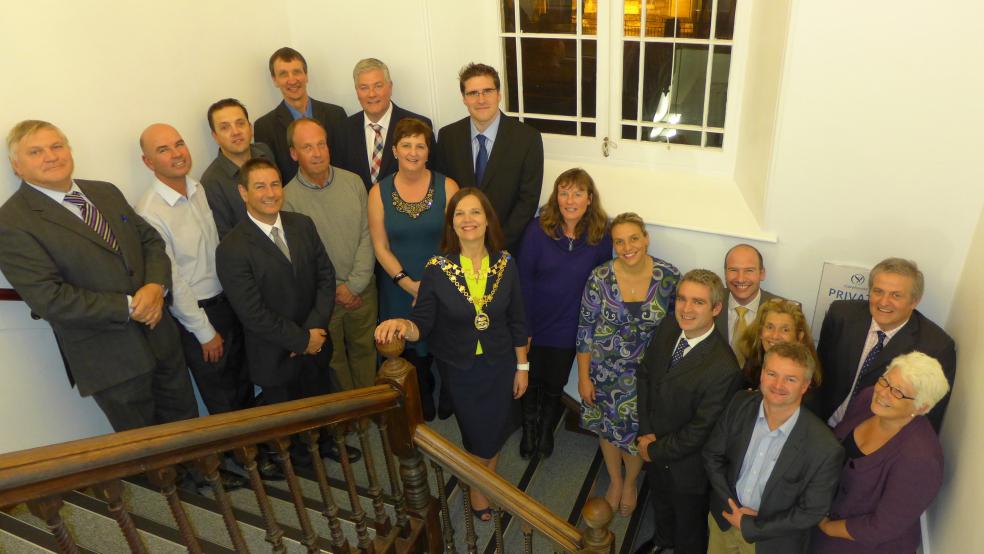 Photograph By Glen King - Centre: Cllr Sue Griggs, Mayor of Tiverton with Clare House construction consultants to her left and the partners of Clare House Surgery on the right.