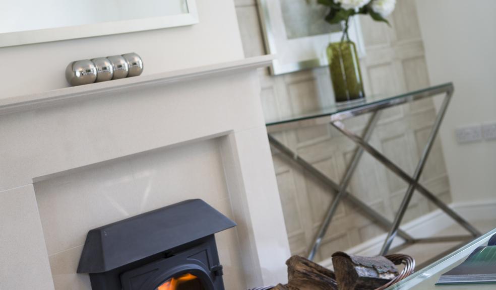 the Lounge with fire in Show Home at Wyndham Place.