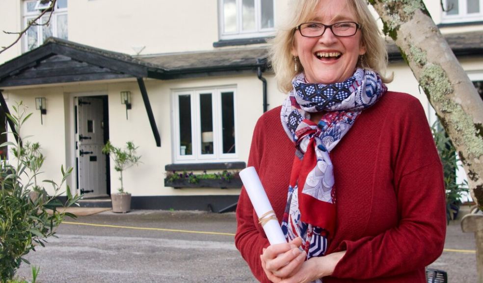 Helen Sieroda – founder and director of Wise Goose Coaching with her B Corp certificate (Photo Credit: Sybille Schiffmann) Helen Sieroda – founder and director of Wise Goose Coaching with her B Corp certificate