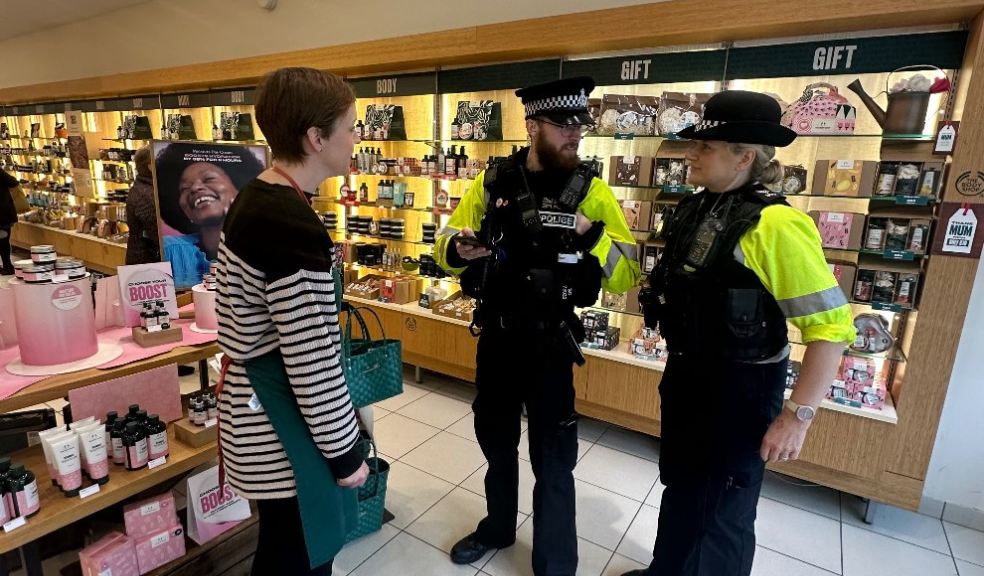 Photo: officers speaking with local retailers in Plymouth