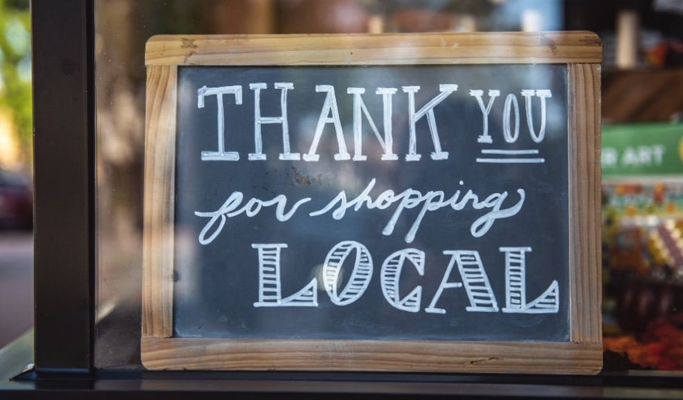 Shallow focus photo of 'thank you' for shopping signage - By Tim Mossholder