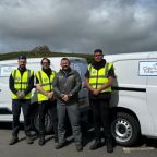 Dartmoor marshals stood in front of vans in Dartmoor