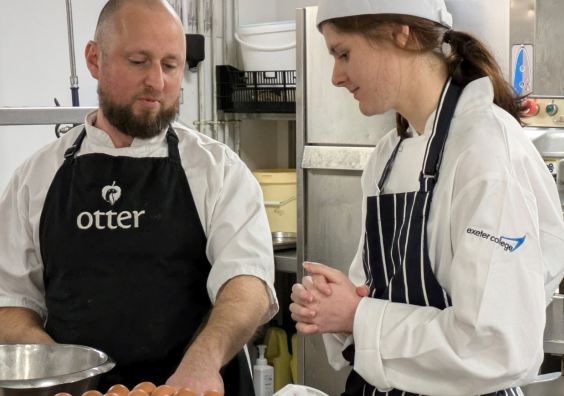 Head Chef Simon Raynor with one of the students