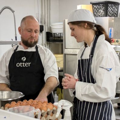 Head Chef Simon Raynor with one of the students