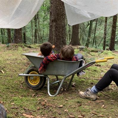 Children in wheelbarrow