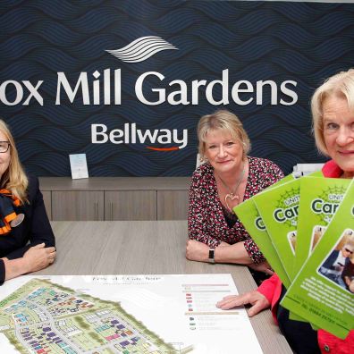 Jill Moores, Bellway Sales Advisor, with Sharon Trerise, General Manager at Unite Carers, and Bernice Philbrick, Chair of Trustees at Unite Carers inside the sales office at Bellway’s Fox Mill Gardens development in Willand.