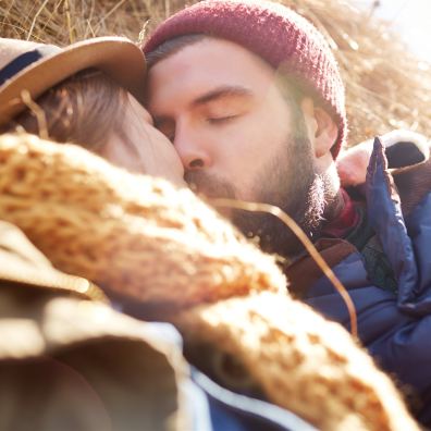 Farming couple kissing