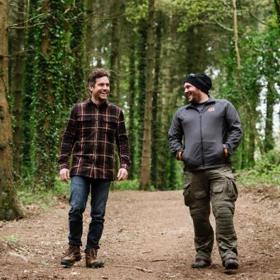 Two men in a forest