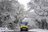 A SWASFT ambulance responding to a call in the snow. 