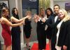 Group of lawyers toasting with a glass of fizz