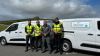 Dartmoor marshals stood in front of vans in Dartmoor